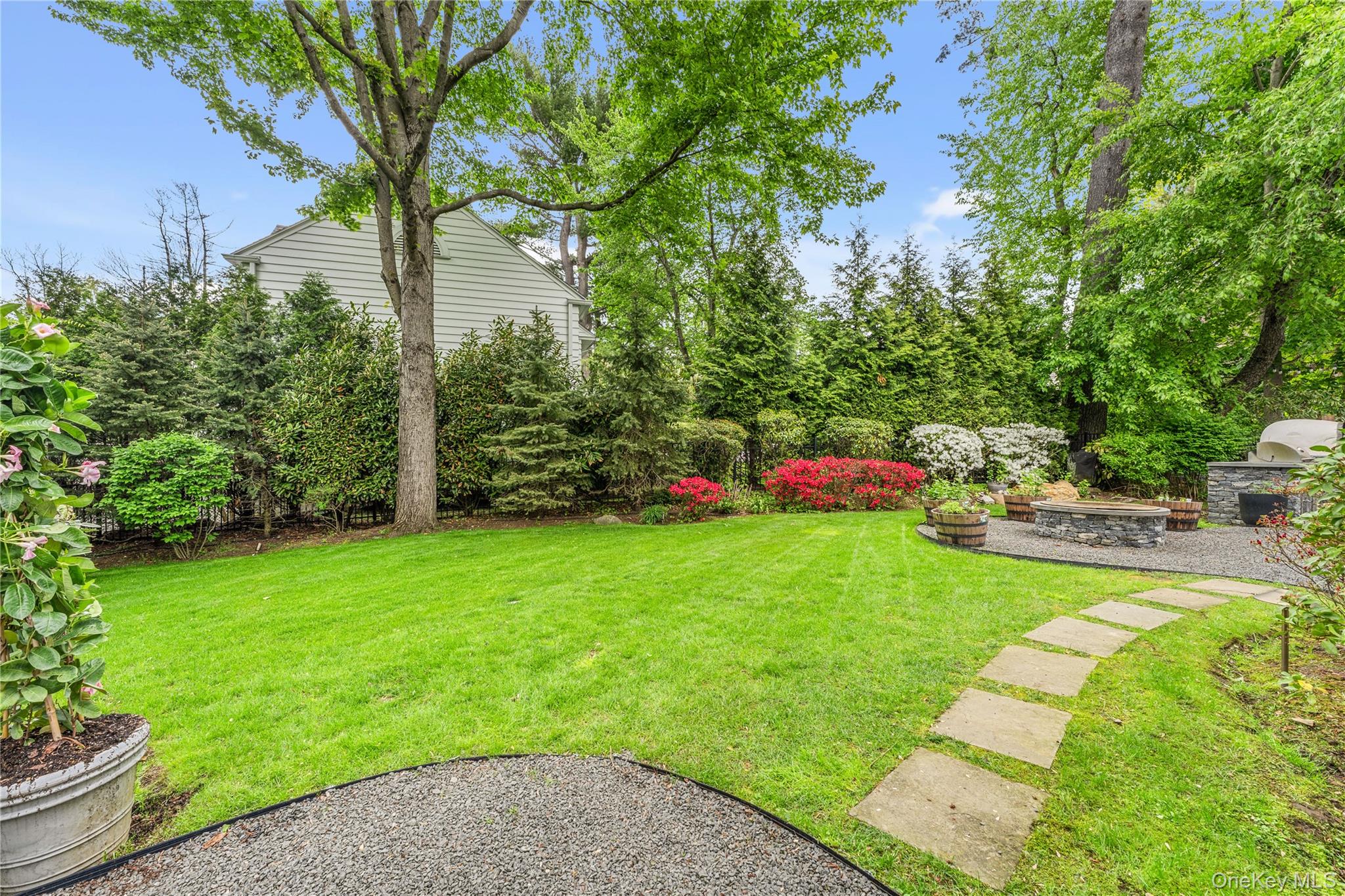5 Harcourt Road Scarsdale, NY 10583 - Photo 28 of 44 Beautifully landscaped level backyard