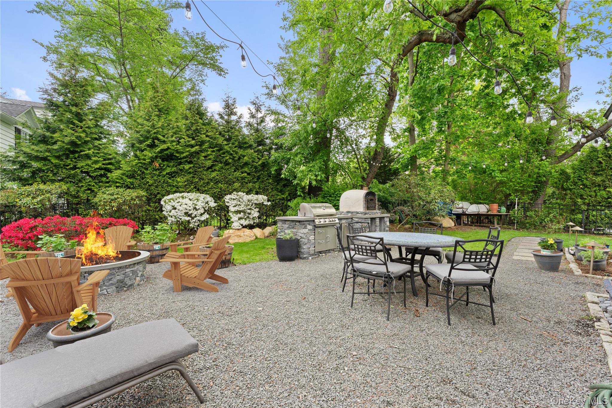5 Harcourt Road Scarsdale, NY 10583 - Photo 29 of 44 Enjoy al fresco dining and built in fire pit!