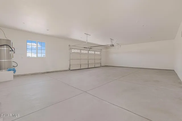 a view of a room with an empty space