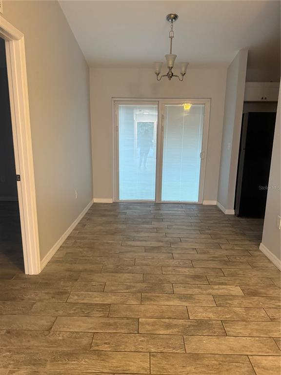 2596 Landover Boulevard Spring Hill, FL 34608 - Photo 6 of 16 a view of a hallway with front door