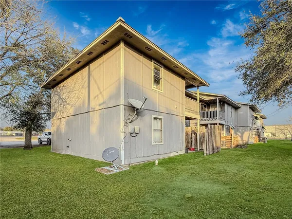 a view of a backyard with a garden