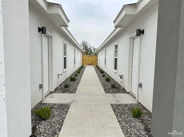 wooden floor with a white walls