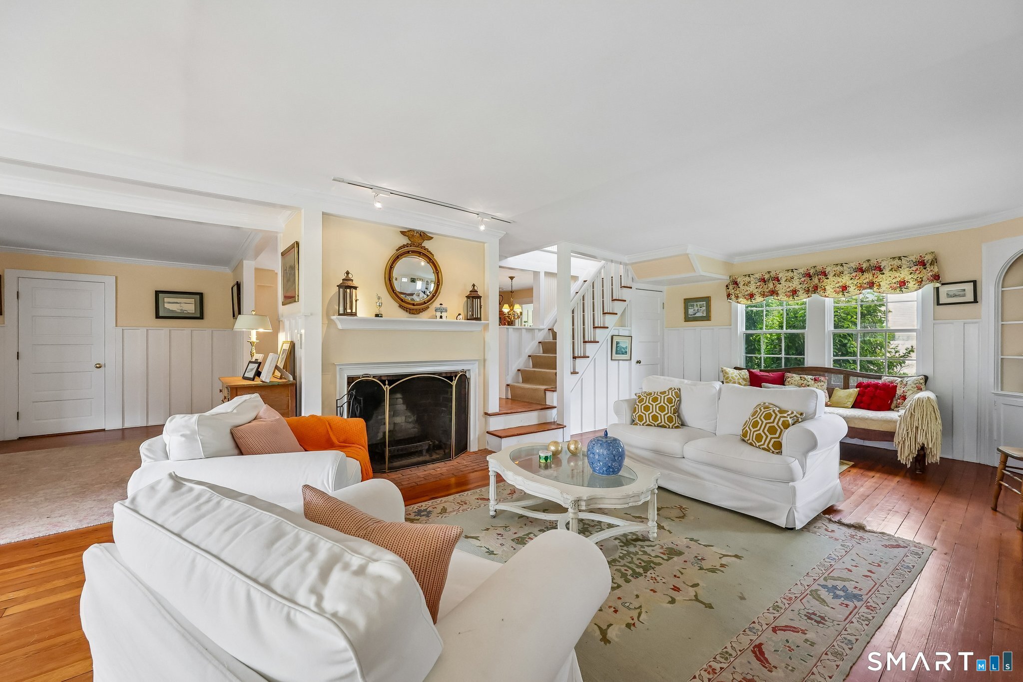 153 Middle Beach Road Madison, CT 06443 - Photo 6 of 40 A beautiful wood-burning fireplace creates a lovely ambiance