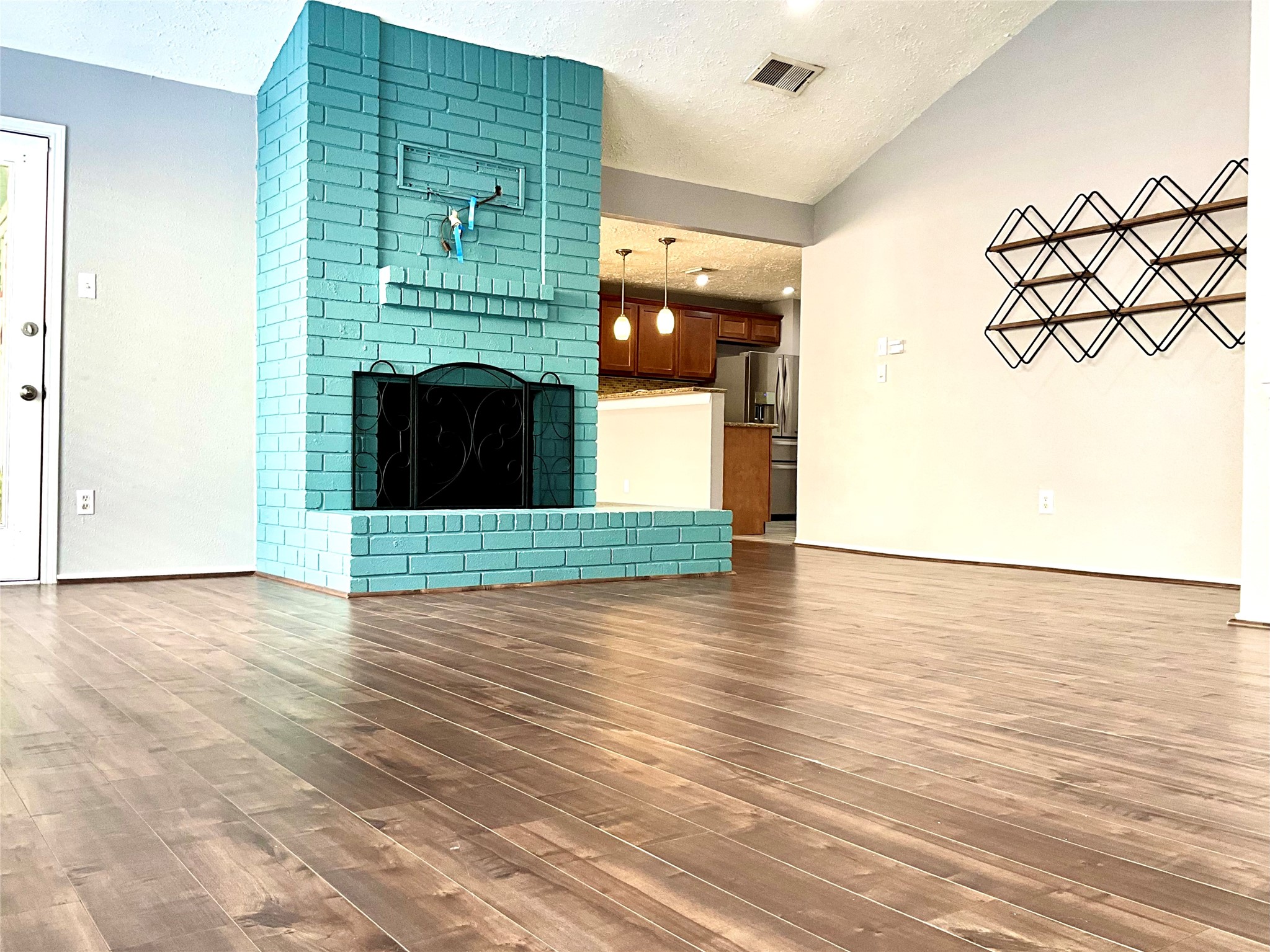 11827 Moss Branch Road Houston, TX 77043 - Photo 5 of 41 a view of livingroom with furniture and a fireplace