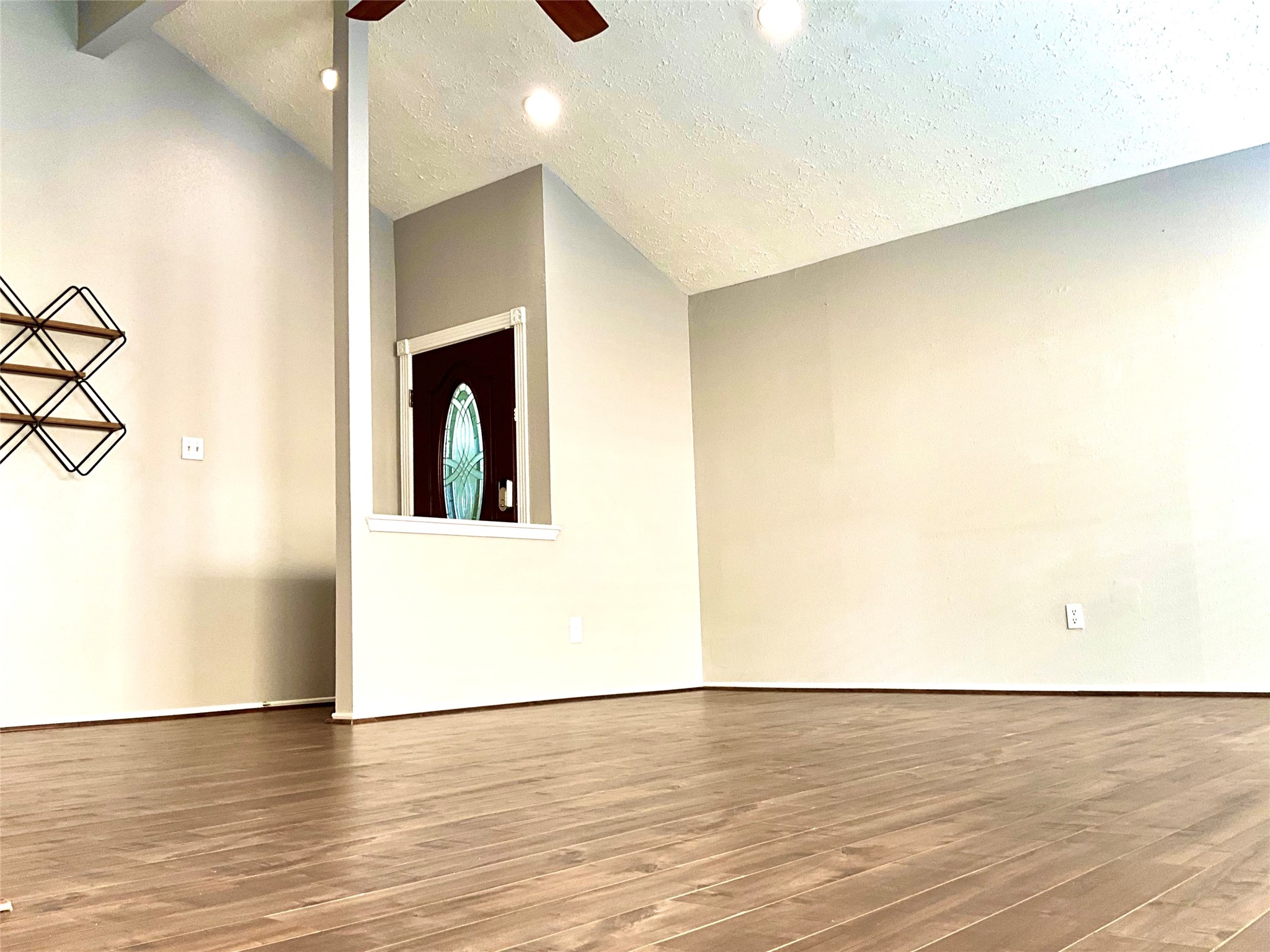 11827 Moss Branch Road Houston, TX 77043 - Photo 6 of 41 a view of a room with wooden floor and white doors