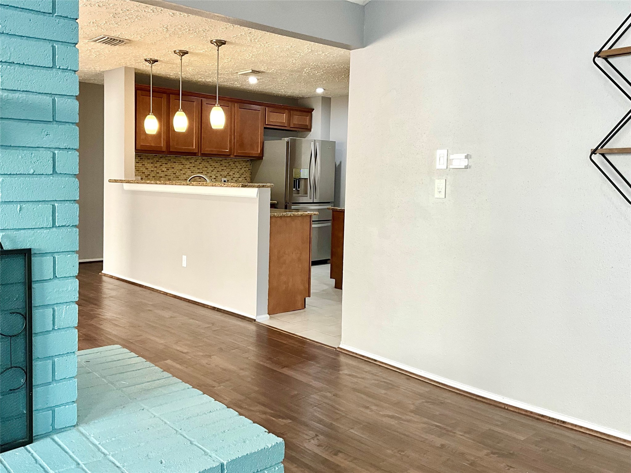 11827 Moss Branch Road Houston, TX 77043 - Photo 7 of 41 a view of a kitchen with a sink and cabinets