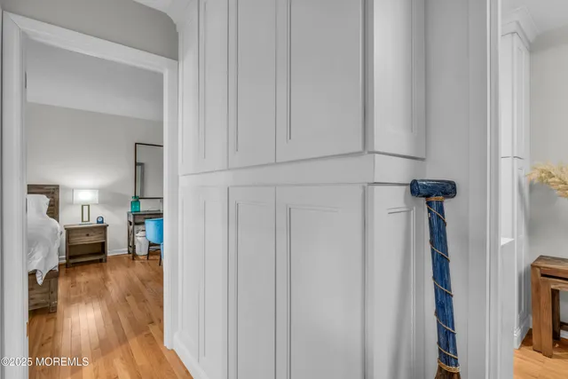 a view of a living room and hardwood floor