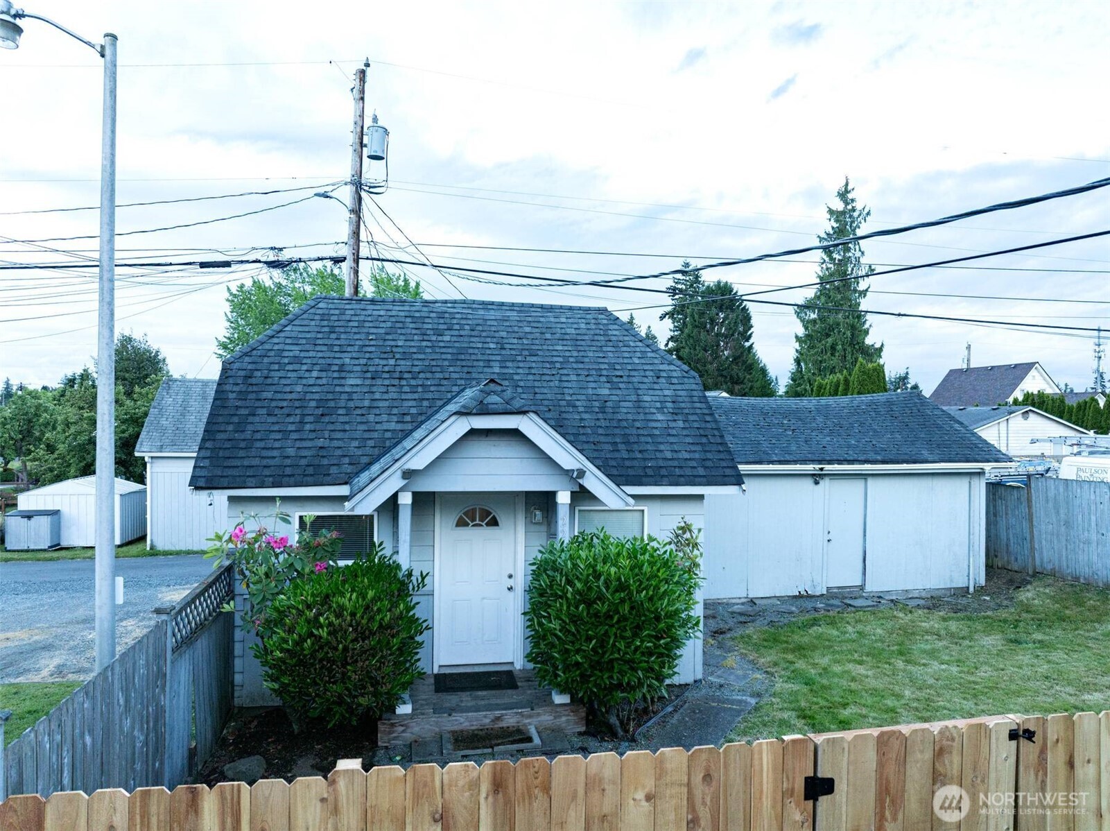 2220 Summit Avenue Everett, WA 98201 - Photo 23 of 26 a front view of house with a yard and potted plants