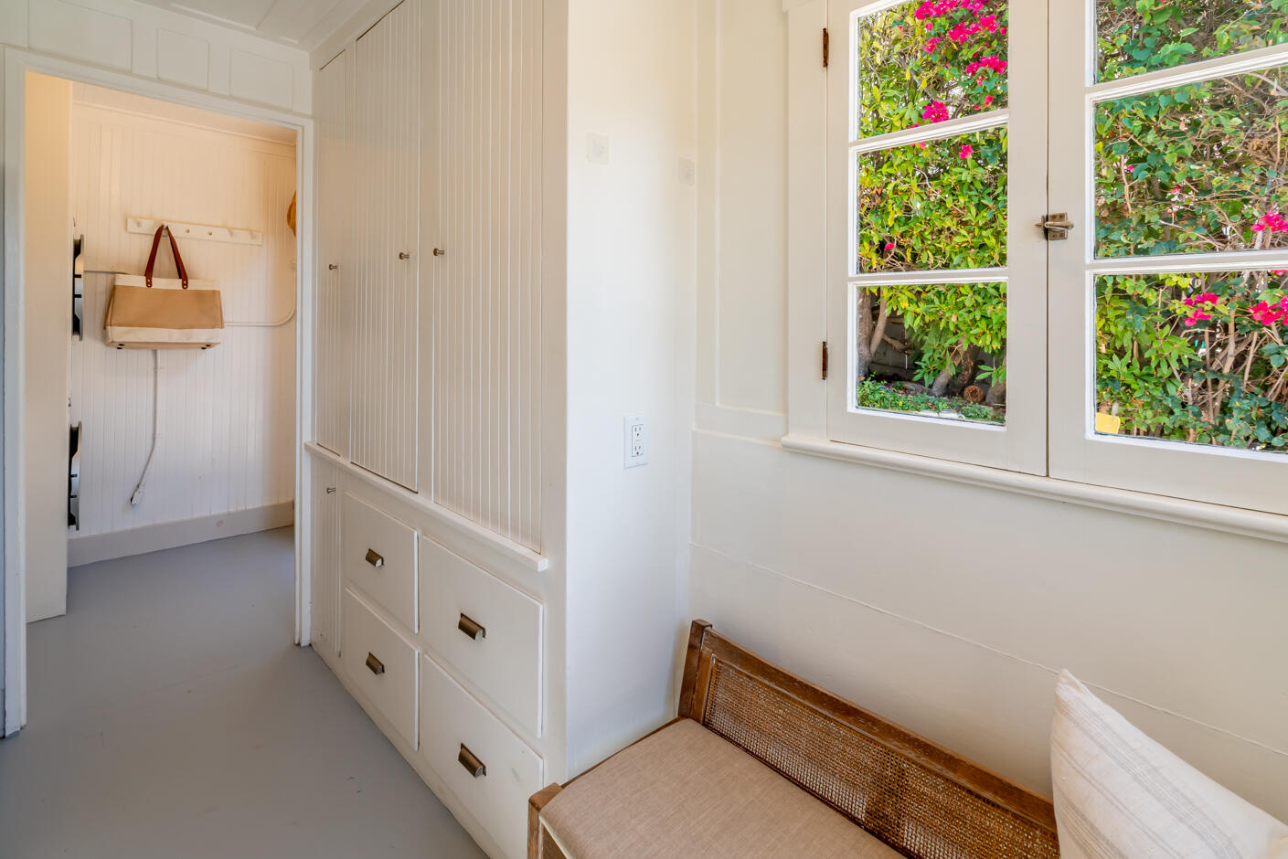 1766 Prospect Avenue Santa Barbara, CA 93103 - Photo 11 of 32 a view of a bedroom with baby bed and a window