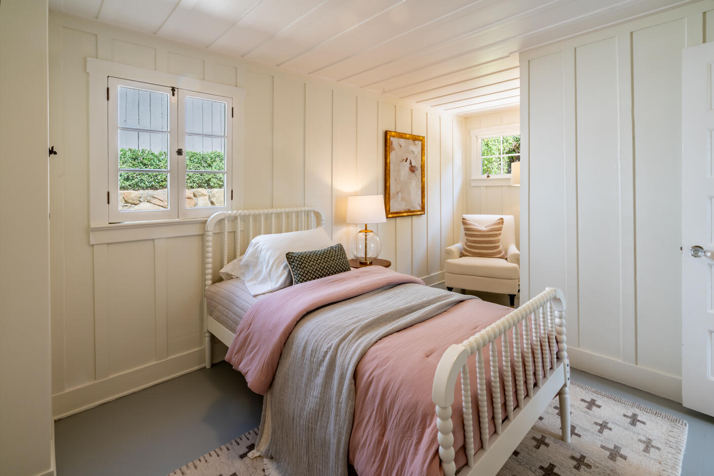 1766 Prospect Avenue Santa Barbara, CA 93103 - Photo 16 of 32 a bedroom with a bed and a window