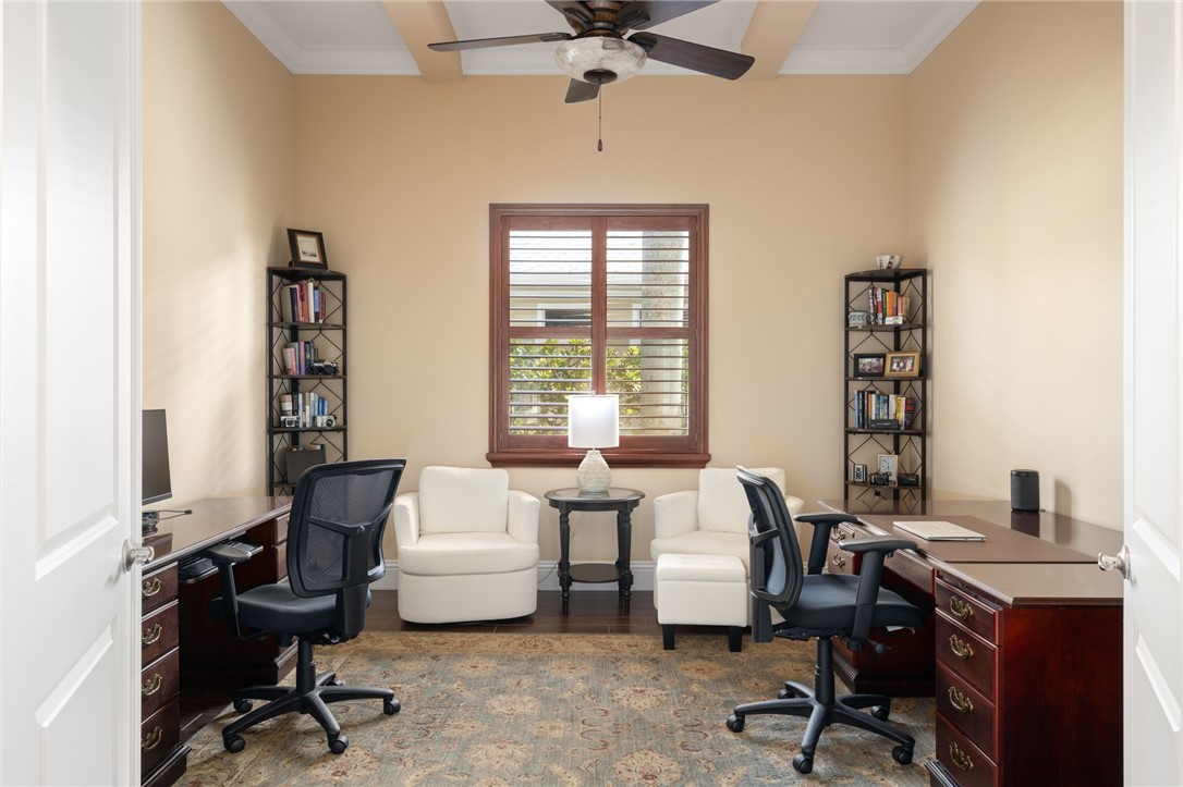 1101 River Wind Circle Vero Beach, FL 32967 - Photo 14 of 36 a view of a workspace with furniture and a window