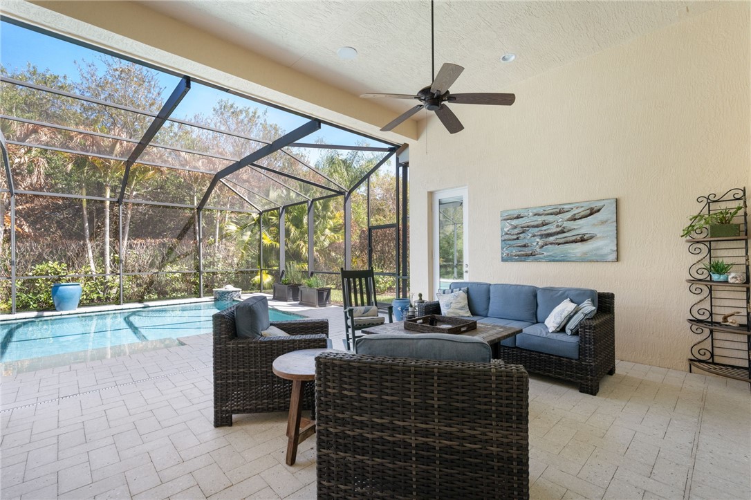 1101 River Wind Circle Vero Beach, FL 32967 - Photo 27 of 36 a living room with furniture and a window