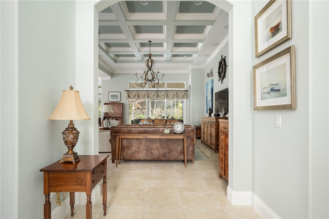 1101 River Wind Circle Vero Beach, FL 32967 - Photo 3 of 36 a room with fireplace and furniture