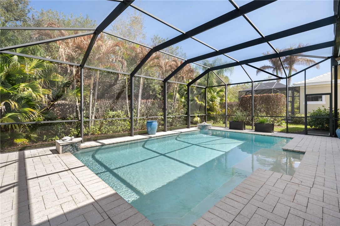 1101 River Wind Circle Vero Beach, FL 32967 - Photo 31 of 36 a view of outdoor space with swimming pool