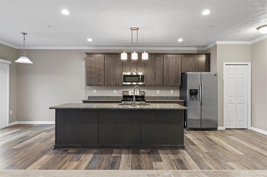 149 Lockheed Drive Coraopolis, PA 15108 - Photo 12 of 48 a large kitchen with granite countertop a large counter top a refrigerator and a sink
