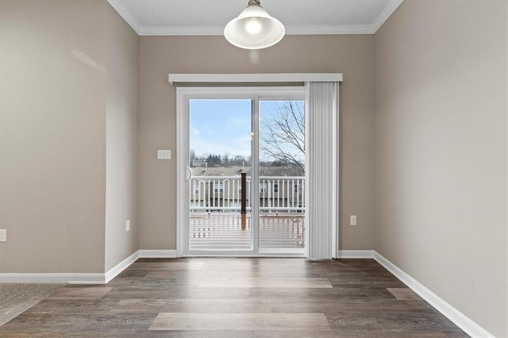 149 Lockheed Drive Coraopolis, PA 15108 - Photo 16 of 48 an empty room with wooden floor and windows