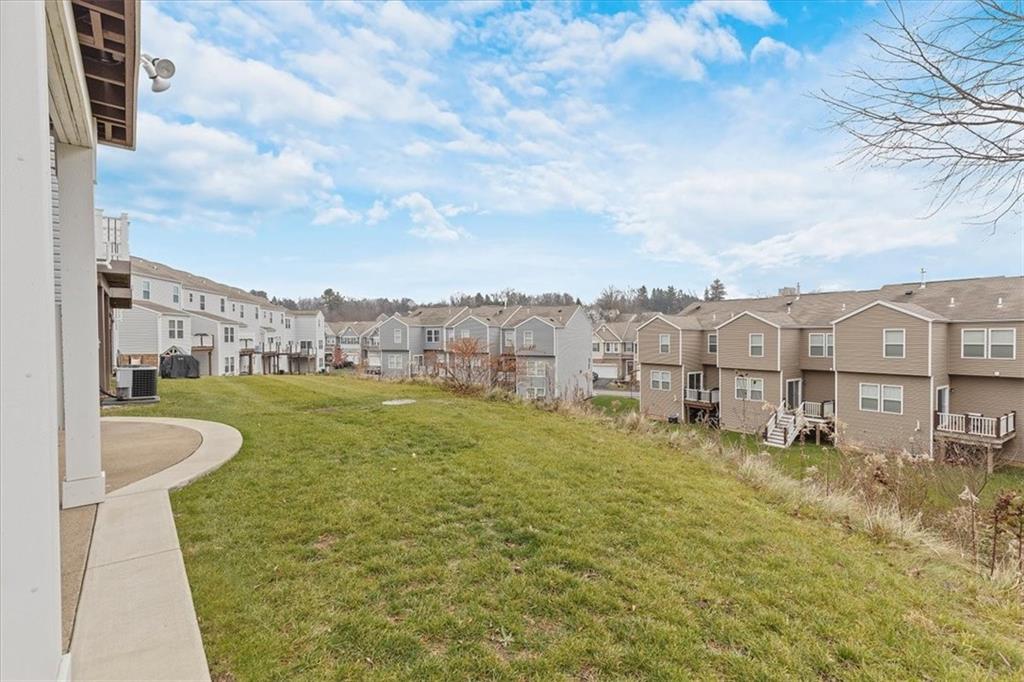 149 Lockheed Drive Coraopolis, PA 15108 - Photo 46 of 48 a view of a lake with a building in the background