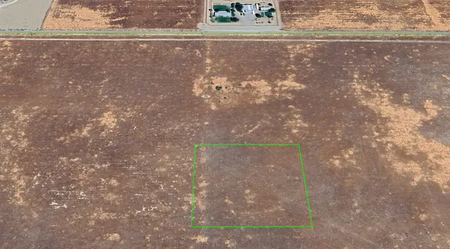 a black and white photo of a swimming pool