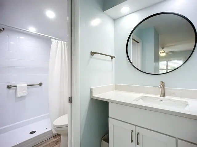 a view of a balcony with mountain view and wooden floor
