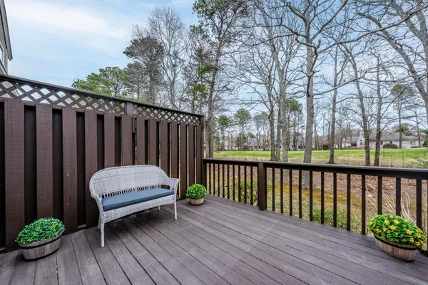 a view of outdoor space with deck and yard