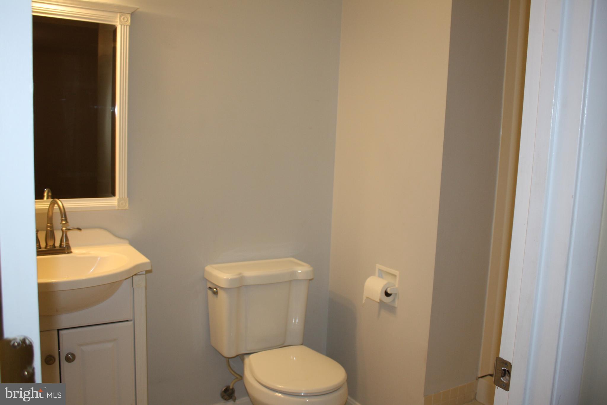 6261 Alforth Avenue Alexandria, VA 22315 - Photo 29 of 29 a bathroom with a sink and a toilet