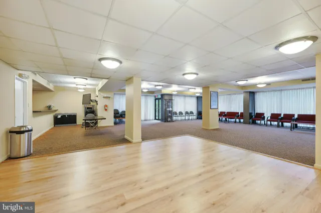 a kitchen with stainless steel appliances granite countertop a stove a sink dishwasher and a refrigerator