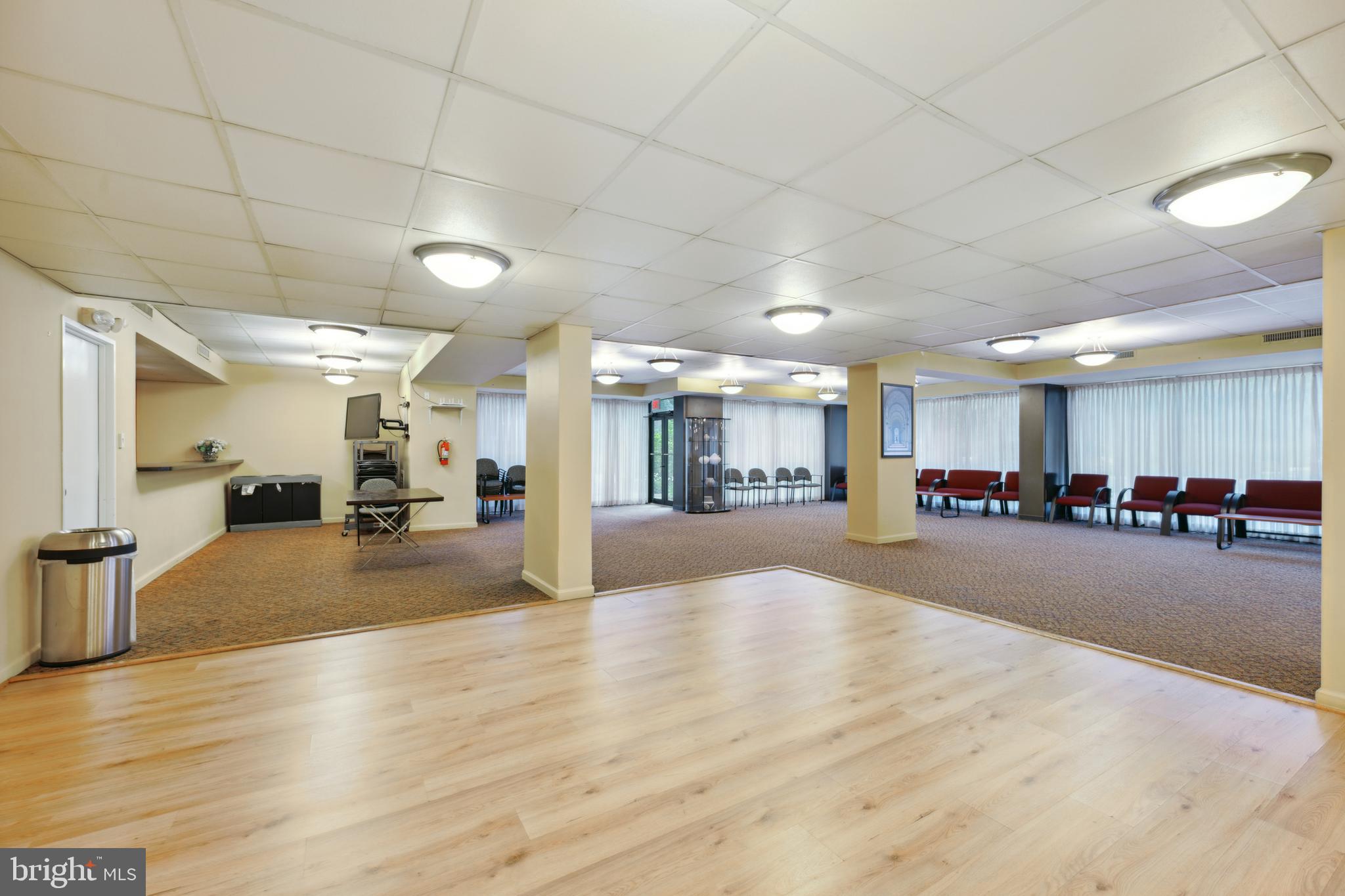 2939 Van Ness Street Northwest, Unit 1243 Washington, DC 20008 - Photo 27 of 33 a view of a room with kitchen and living room