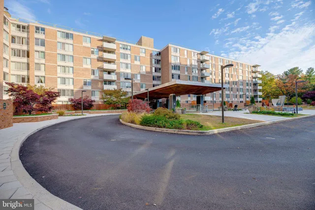 a view of a deck with wooden floor and wooden fence