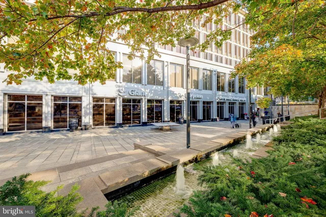 front view of a building with a bench