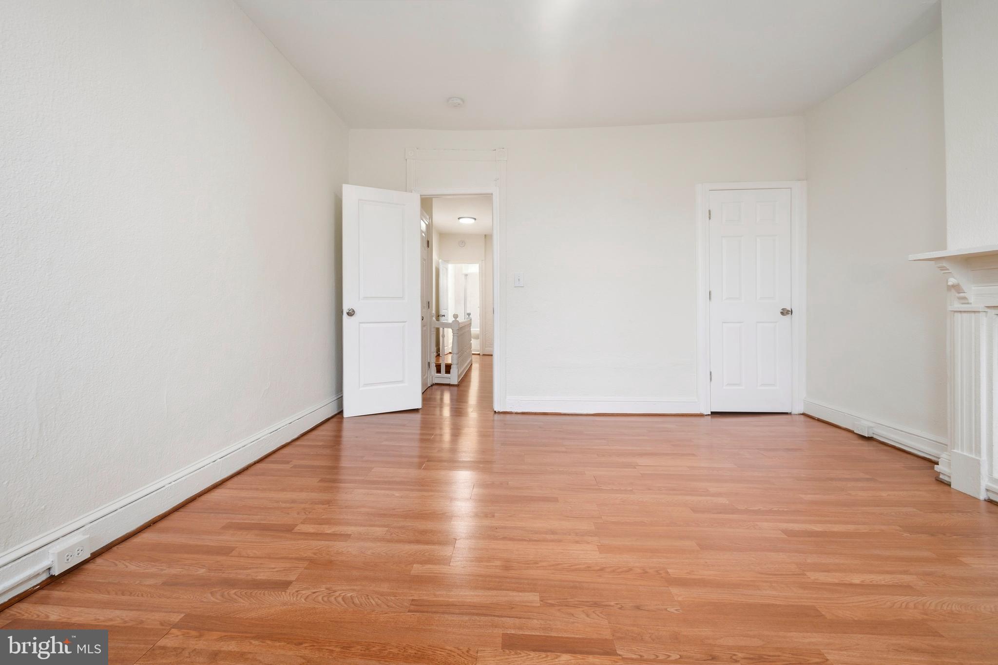 2008 Division Street Baltimore, MD 21217 - Photo 16 of 21 a view of an empty room and wooden floor