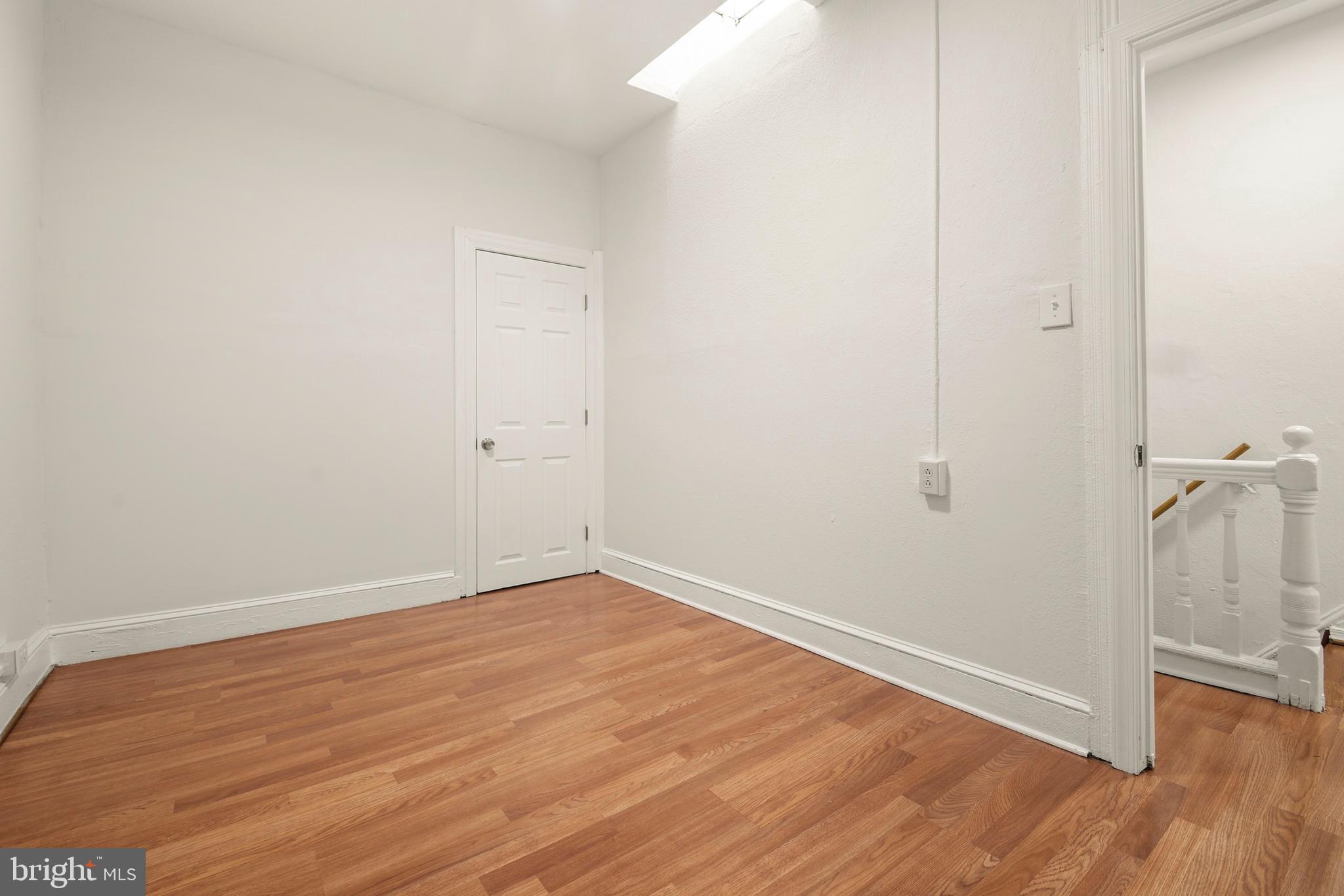 2008 Division Street Baltimore, MD 21217 - Photo 17 of 21 a view of a room with wooden floor