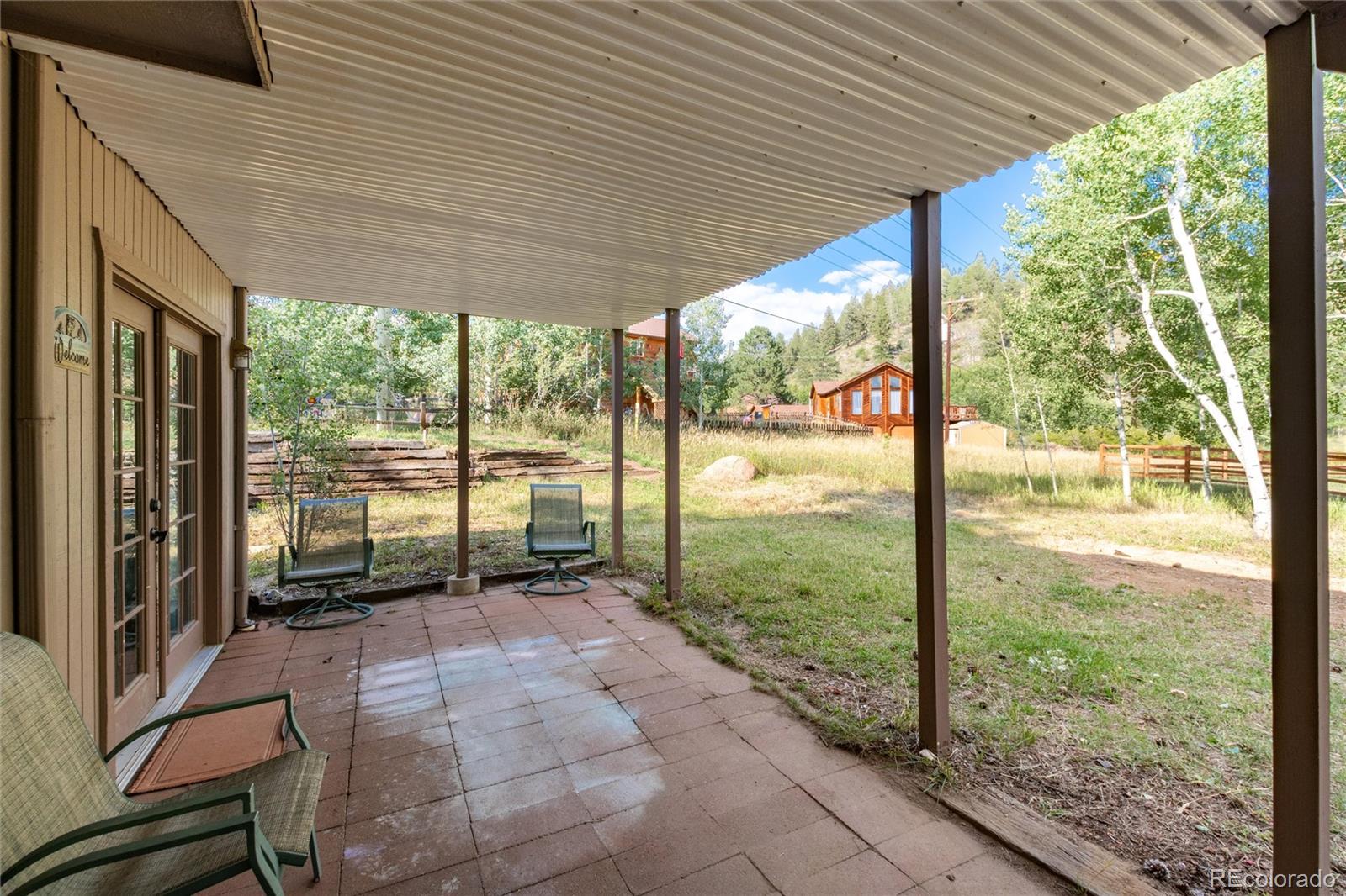 65 Silver Springs Road Bailey, CO 80421 - Photo 22 of 38 a view of a room with a large window