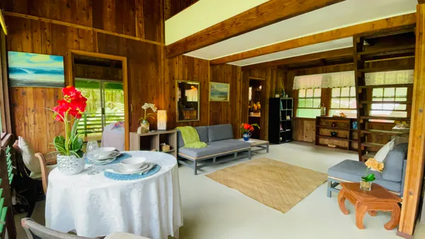 a outdoor living space with furniture and a potted plant