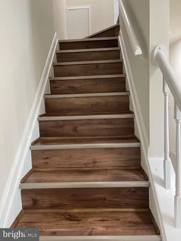 a bathroom with a toilet and a sink