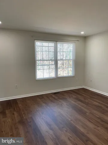 a bathroom with a toilet a sink and bathtub