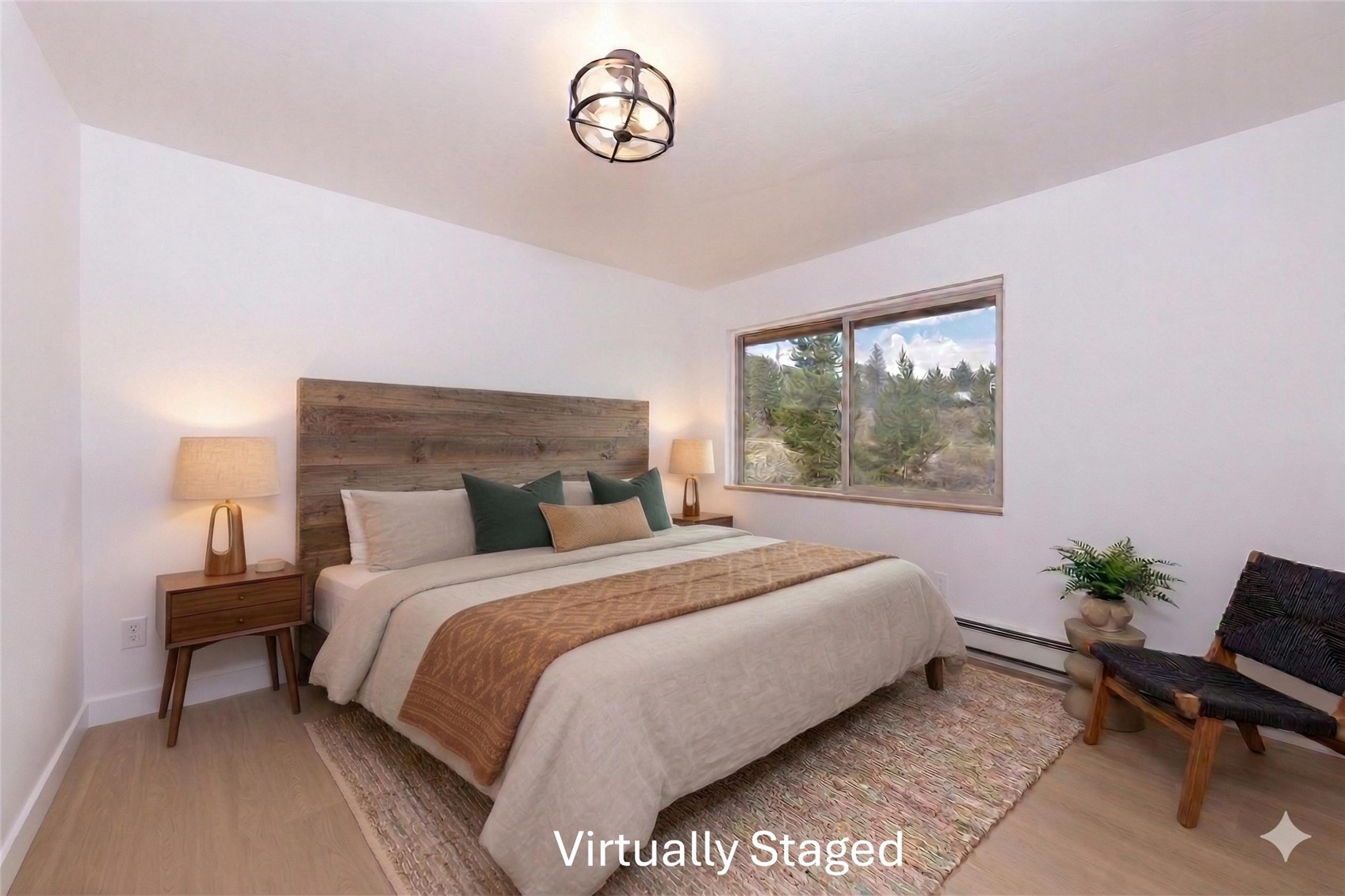 110 Evergreen Road, Unit 303 Dillon, CO 80435 - Photo 15 of 35 a bedroom with a bed table chair and a window