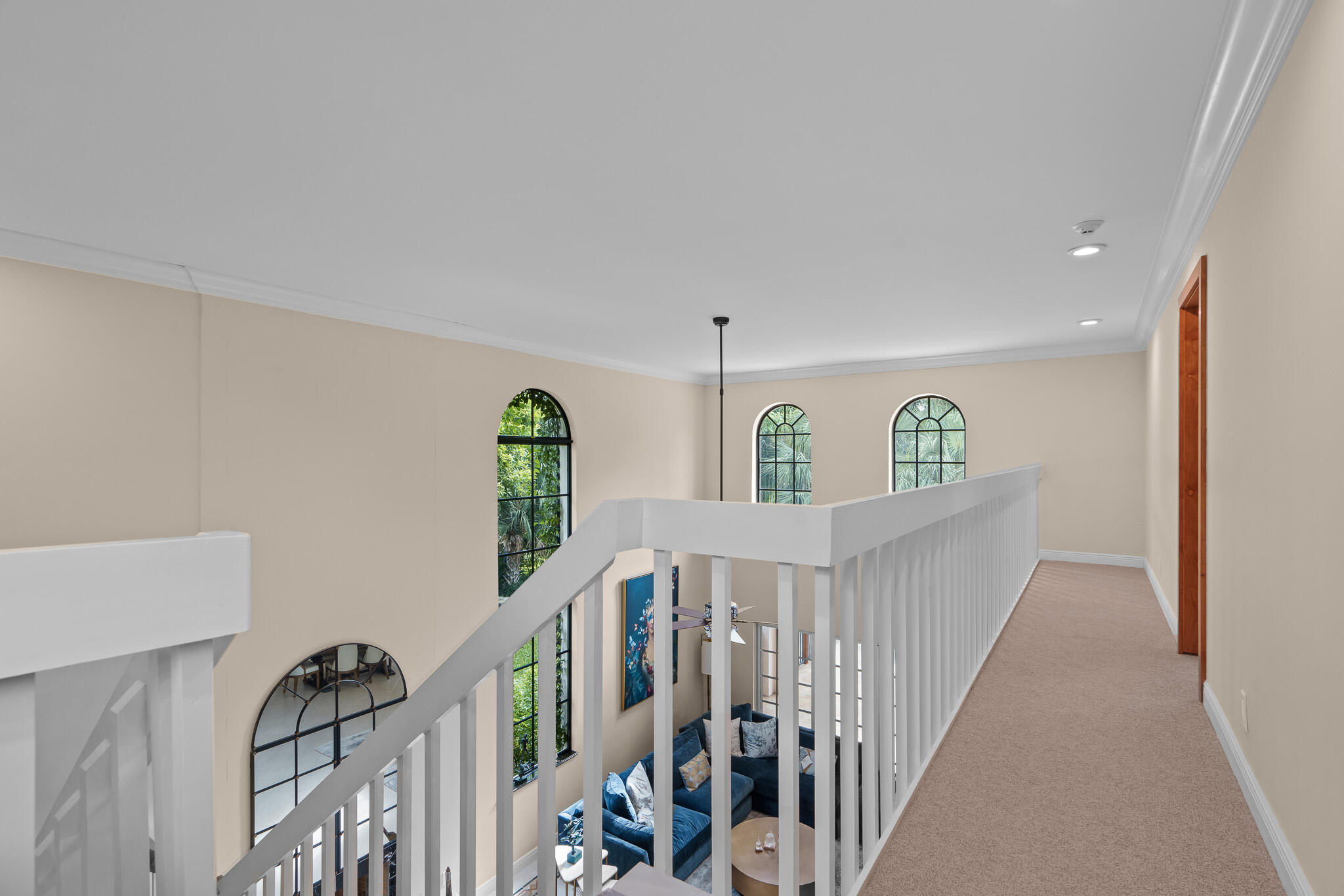 23397 Lago Mar Circle Boca Raton, FL 33433 - Photo 30 of 70 a view of staircase with lots of frames on wall and stairs