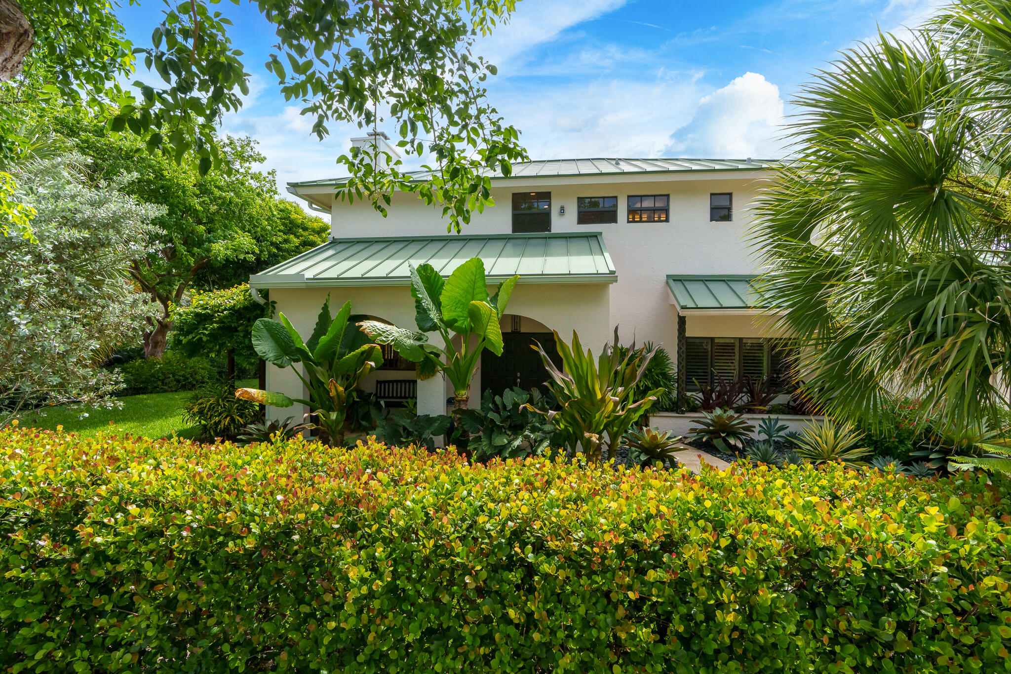 23397 Lago Mar Circle Boca Raton, FL 33433 - Photo 3 of 70 a front view of a house with a yard