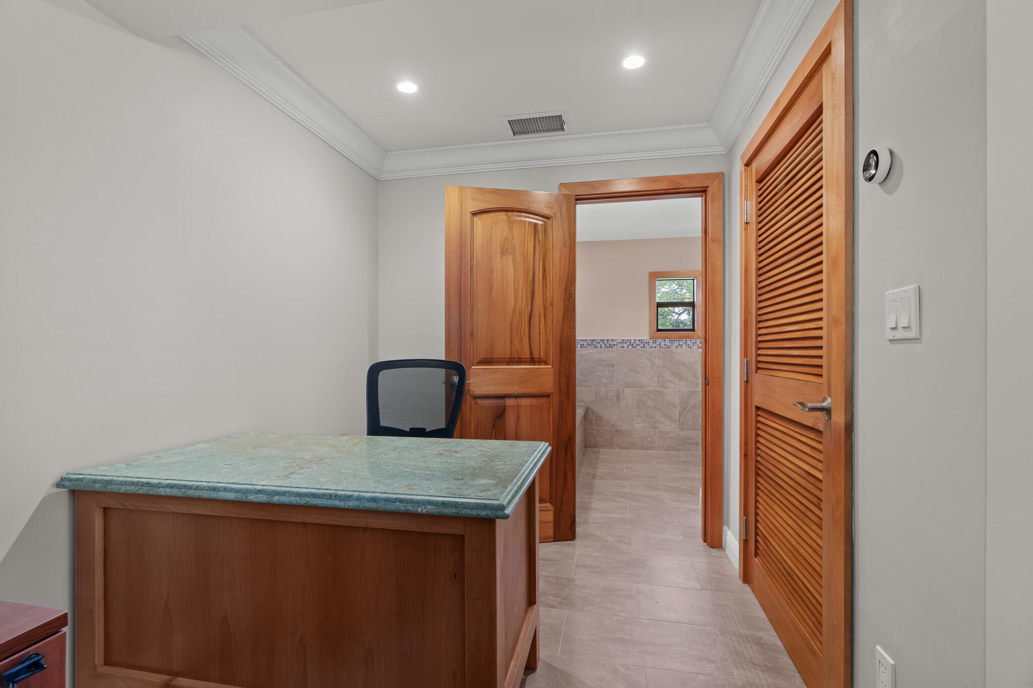 23397 Lago Mar Circle Boca Raton, FL 33433 - Photo 38 of 70 a bathroom with a granite countertop sink and a mirror