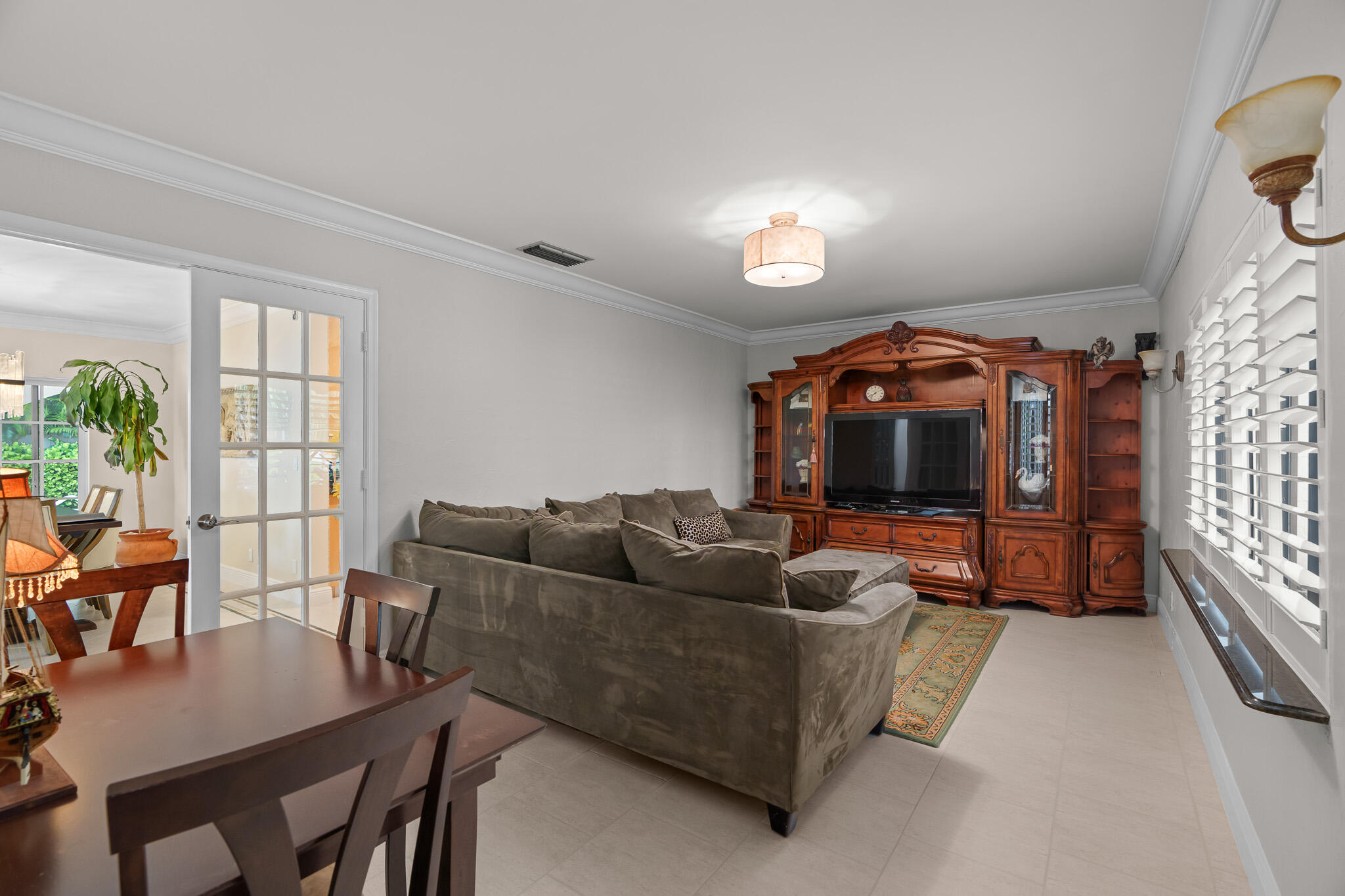 23397 Lago Mar Circle Boca Raton, FL 33433 - Photo 48 of 70 a living room with furniture and a window