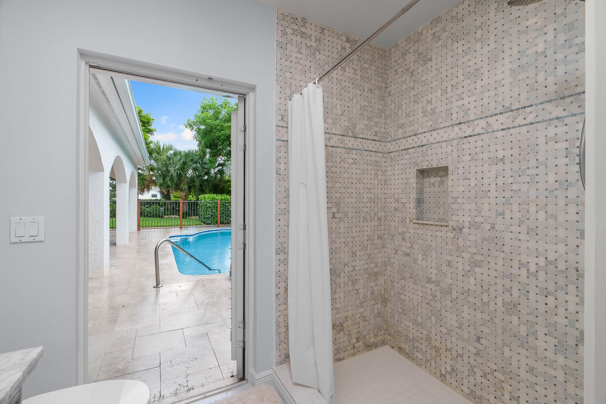 23397 Lago Mar Circle Boca Raton, FL 33433 - Photo 51 of 70 a bathroom with a tub and shower