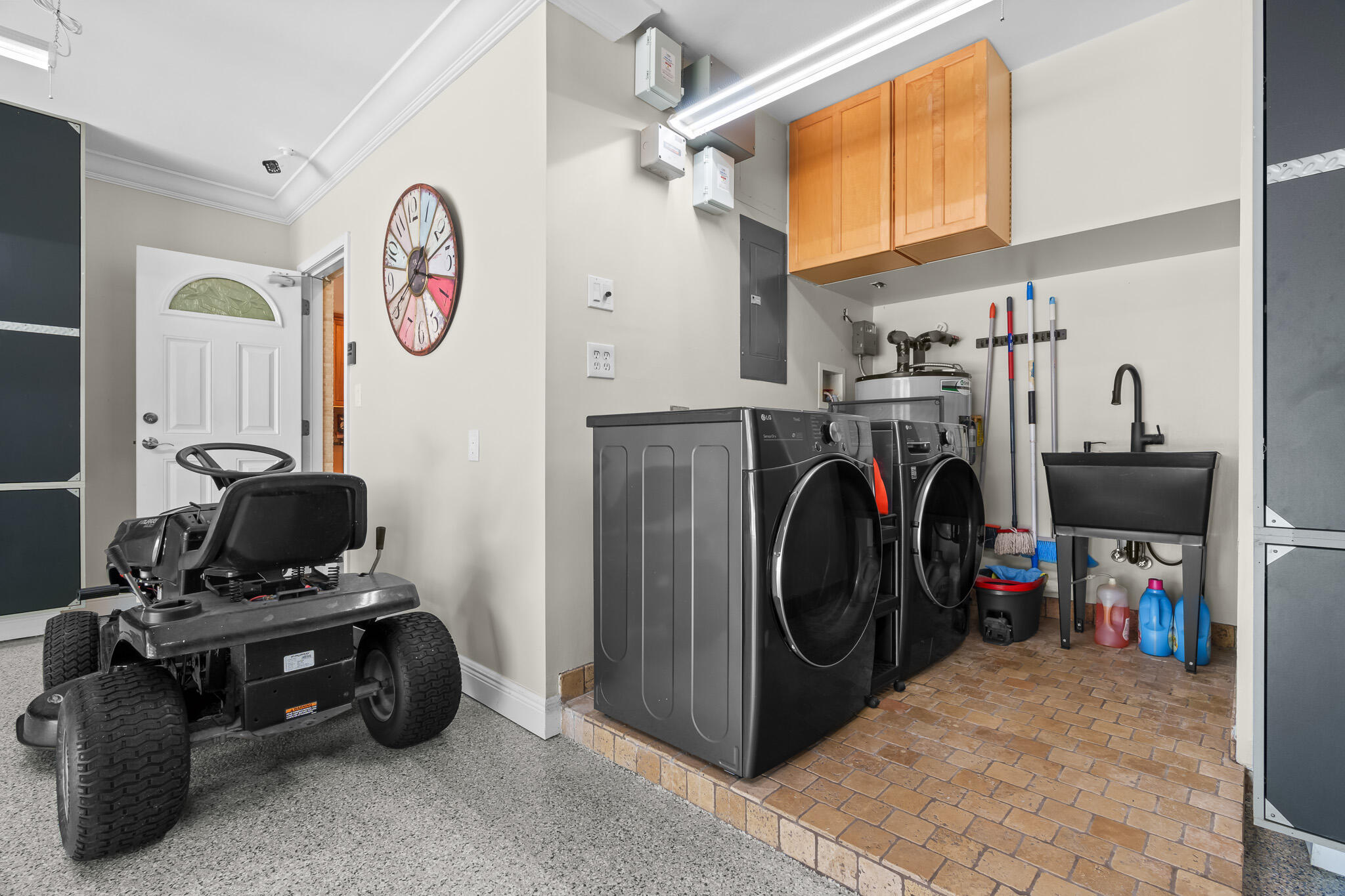 23397 Lago Mar Circle Boca Raton, FL 33433 - Photo 55 of 70 a view of a storage and utility room with washer and dryer