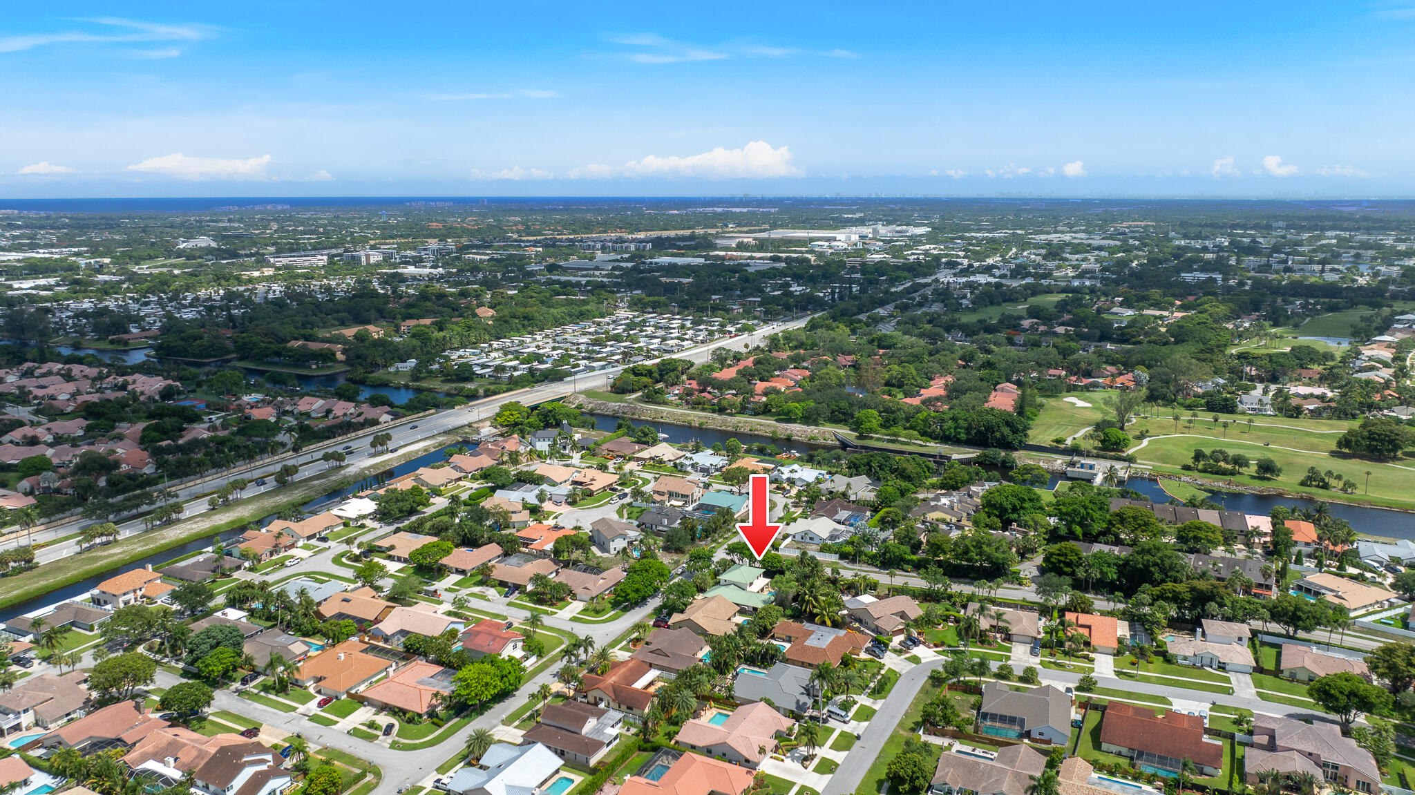 23397 Lago Mar Circle Boca Raton, FL 33433 - Photo 62 of 70 an aerial view of a city