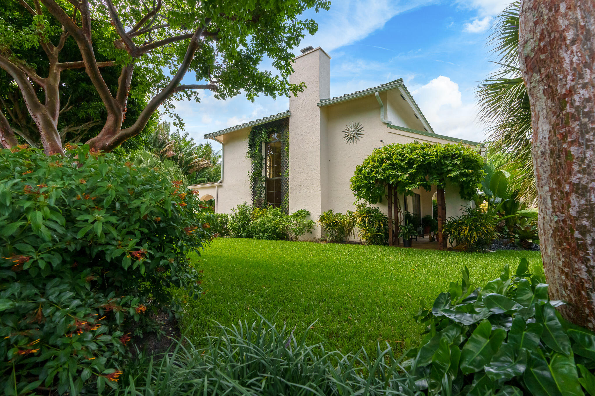 23397 Lago Mar Circle Boca Raton, FL 33433 - Photo 66 of 70 a front view of a house with garden