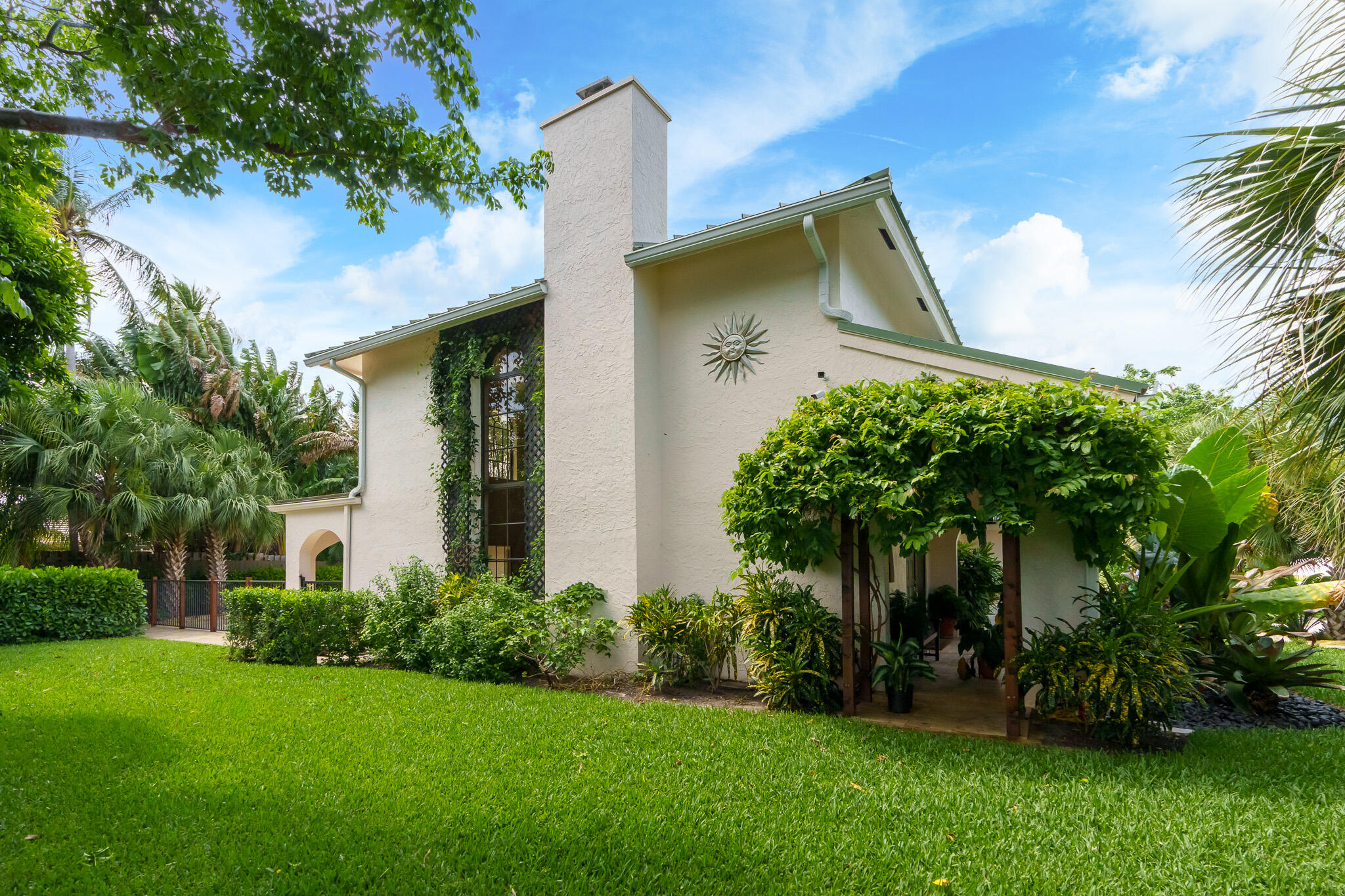 23397 Lago Mar Circle Boca Raton, FL 33433 - Photo 68 of 70 a front view of a house with garden