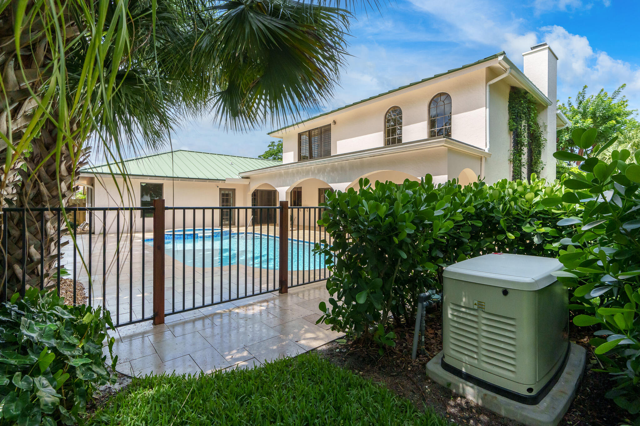 23397 Lago Mar Circle Boca Raton, FL 33433 - Photo 8 of 70 a front view of a house with a garden