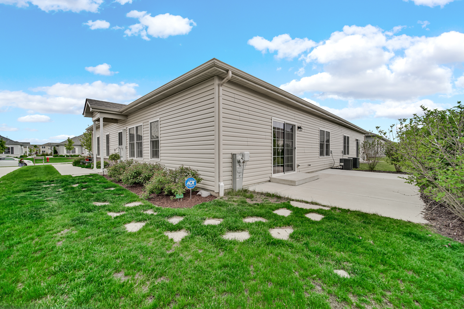 925 Baltimore Street McHenry, IL 60050 - Photo 25 of 27 a front view of a house with garden
