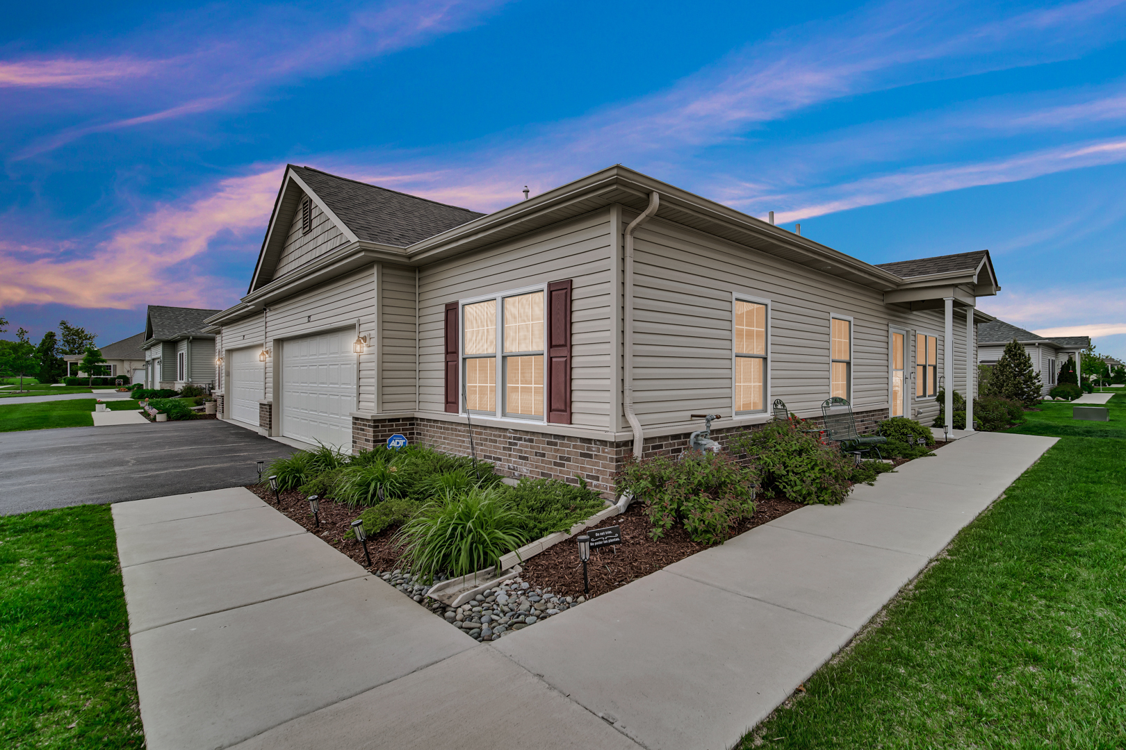 925 Baltimore Street McHenry, IL 60050 - Photo 27 of 27 a front view of a house with a yard