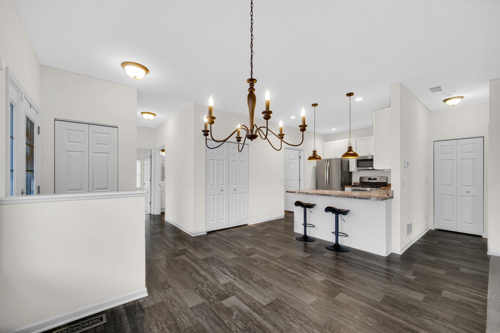 925 Baltimore Street McHenry, IL 60050 - Photo 9 of 27 a view of a kitchen with wooden floor and a sink