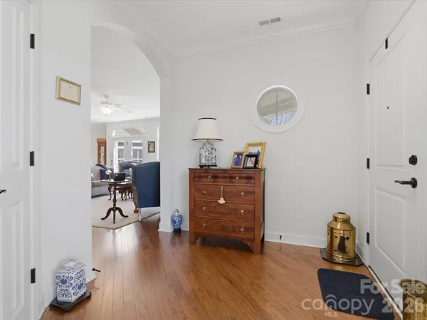 a room with furniture and a mirror